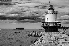Rolling Clouds and Small Boat by Spring Point Ledge Light -BW